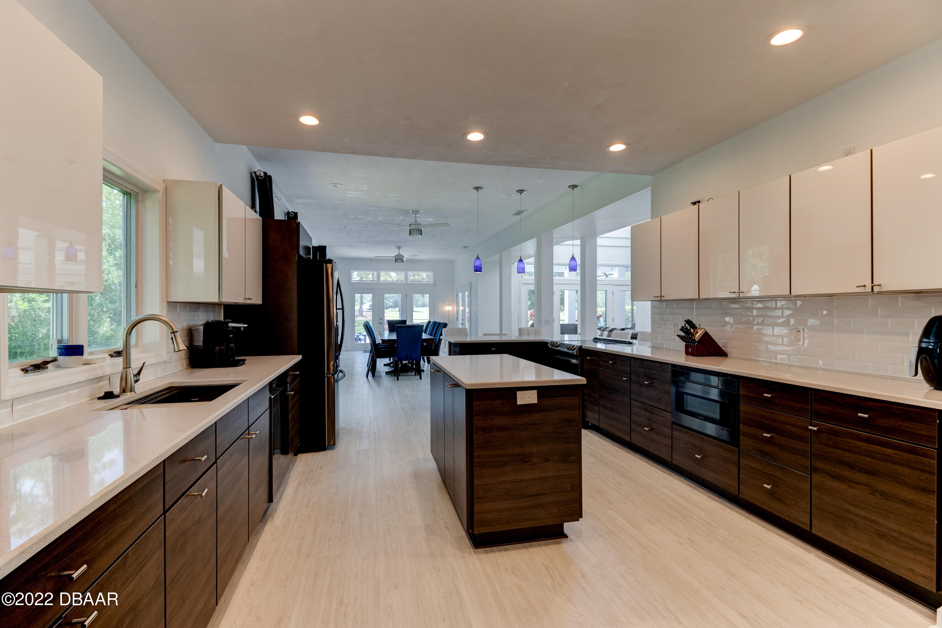 13 Bay Pointe Drive Ormond Beach, FL 32174 - Photo 6 of 44 a kitchen with kitchen island granite countertop a sink counter top space and stainless steel appliances