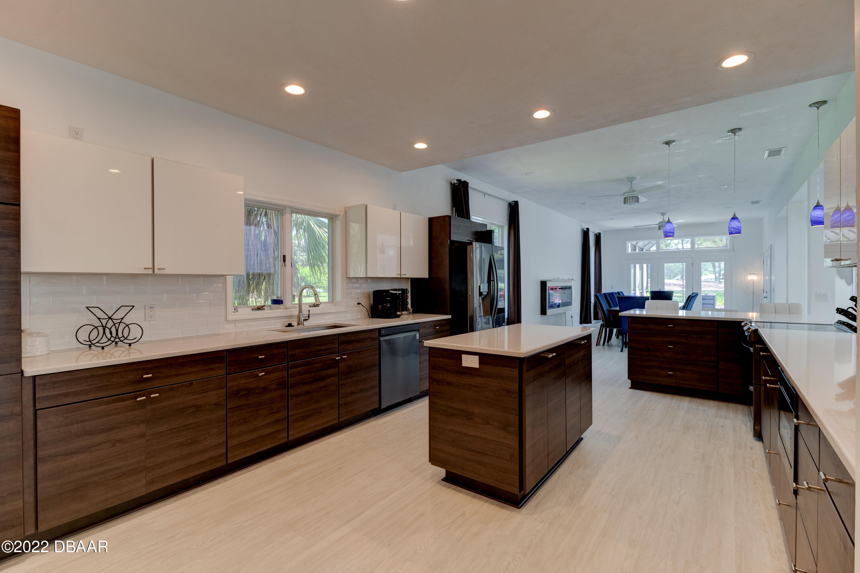 13 Bay Pointe Drive Ormond Beach, FL 32174 - Photo 9 of 44 a large kitchen with stainless steel appliances granite countertop a large counter top and a stove