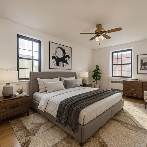 a bedroom with bed and a window