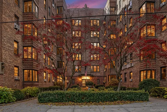 a view of a building with a street