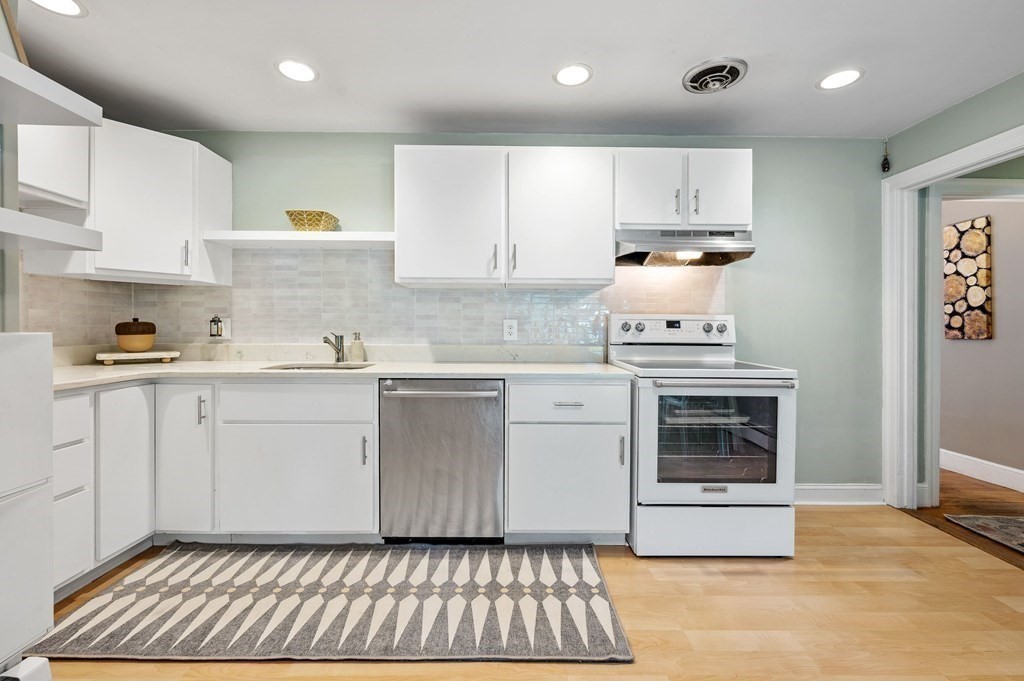 100 Winifred Avenue Worcester, MA 01602 - Photo 1 of 34 a kitchen with cabinets and steel appliances