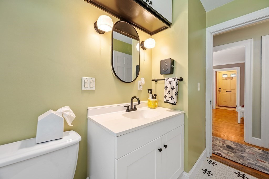 100 Winifred Avenue Worcester, MA 01602 - Photo 12 of 34 a bathroom with a sink vanity mirror and toilet