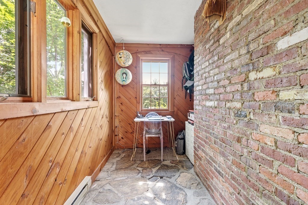 100 Winifred Avenue Worcester, MA 01602 - Photo 16 of 34 a view of entryway with wooden door and chair