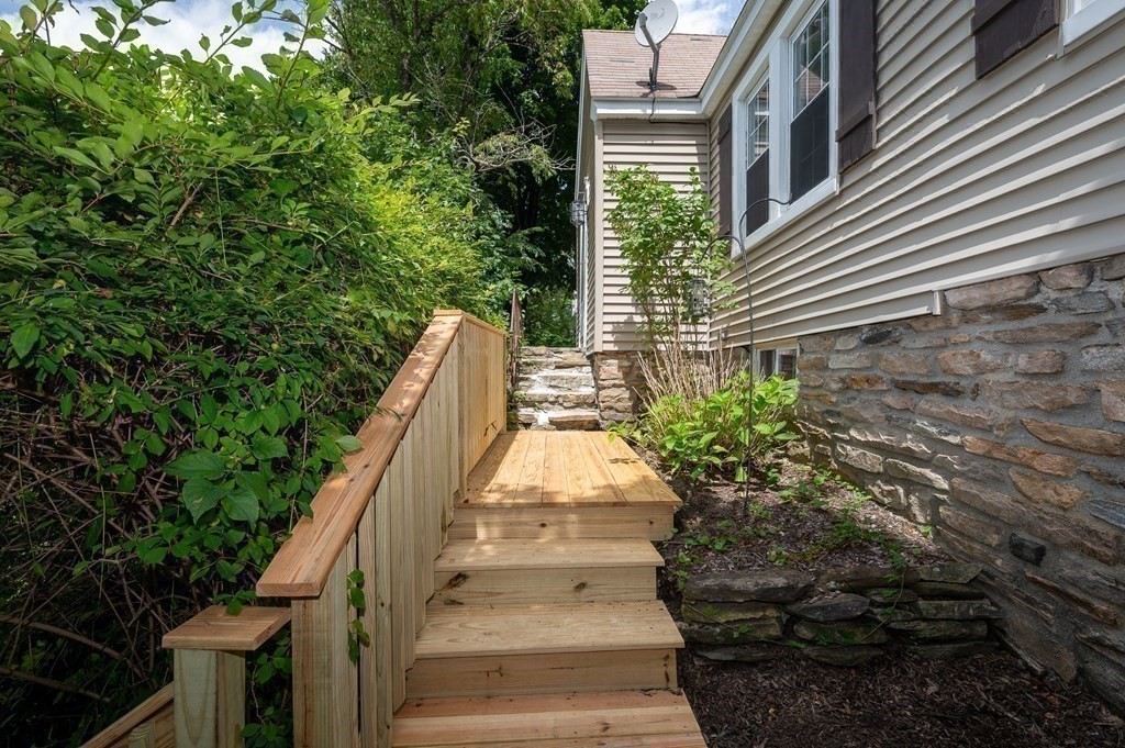 100 Winifred Avenue Worcester, MA 01602 - Photo 18 of 34 a view of a pathway with a house