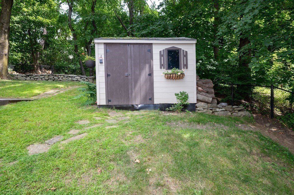 100 Winifred Avenue Worcester, MA 01602 - Photo 31 of 34 a view of backyard with a barn and a large tree