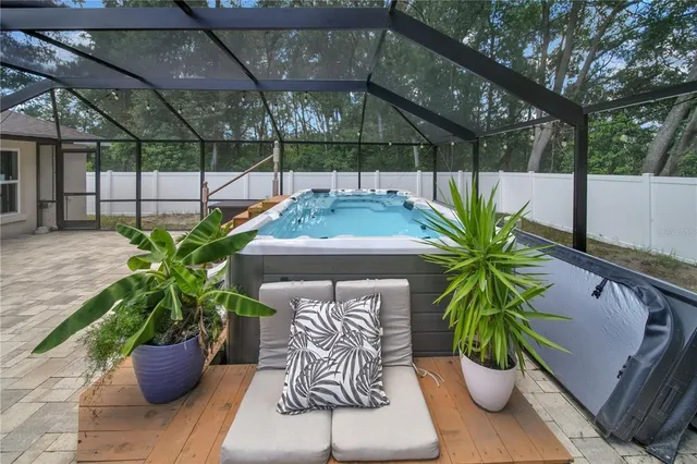 a potted plant sitting on a wooden floor