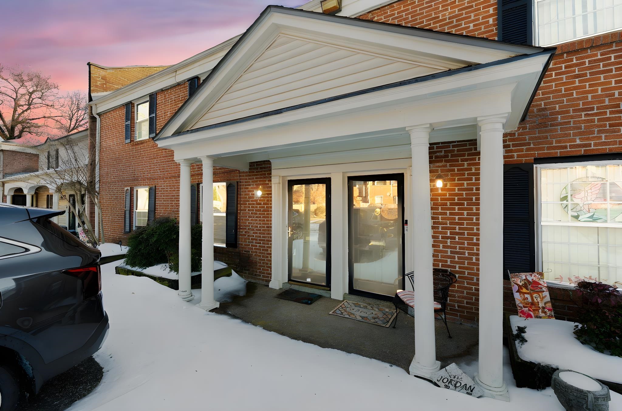 5726 Quince Road, Unit 9 Memphis, TN 38119 - Photo 4 of 21 Exterior entry at dusk with brick siding