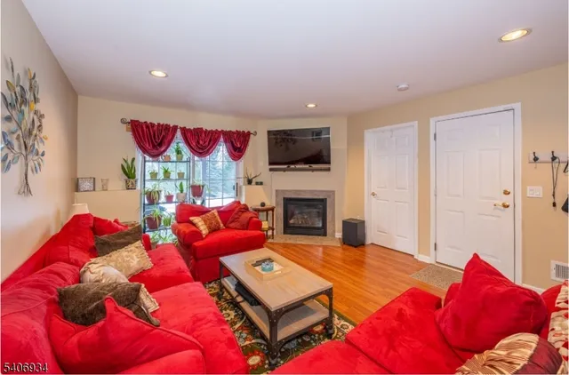 a bedroom with a bed and a fireplace