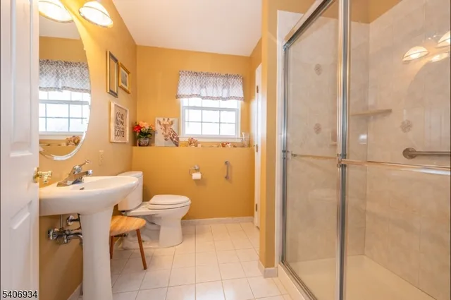 a utility room with a sink washer and dryer