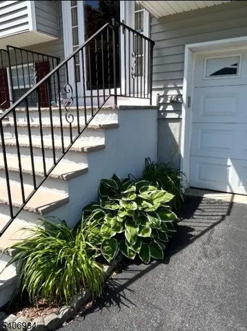 a balcony with trees in front of it