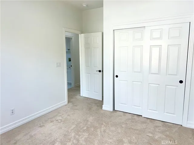a view of a hallway with entryway