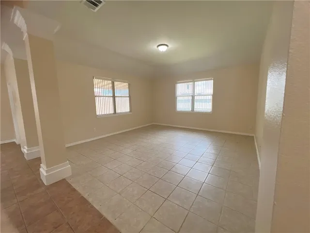 an empty room with windows