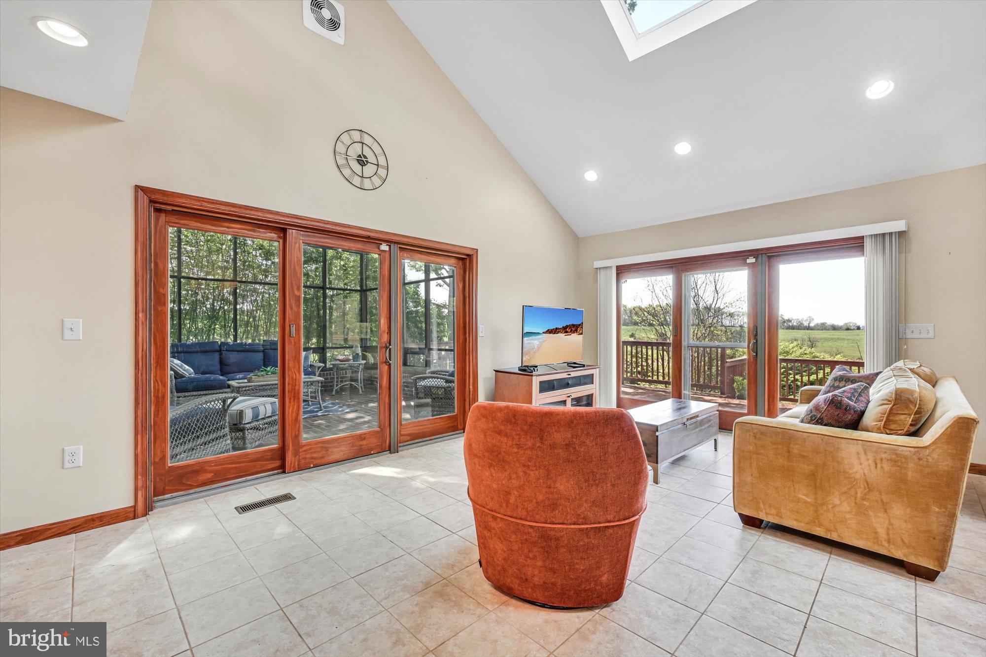 9 Beaver Road Hershey, PA 17033 - Photo 15 of 42 9' doors leading to Solarium off kitchen/gathering