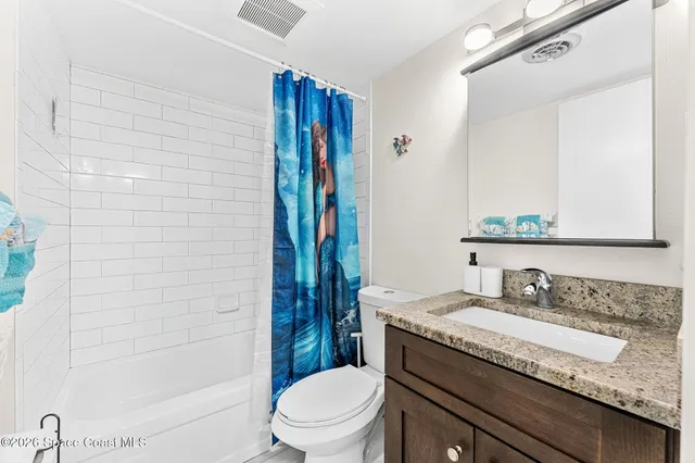 a view of balcony with furniture