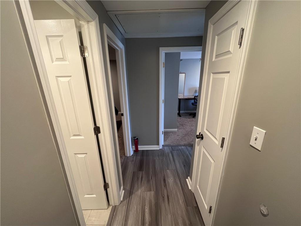 1875 Linton Street Pittsburgh, PA 15219 - Photo 14 of 24 a view of a hallway and wooden floor