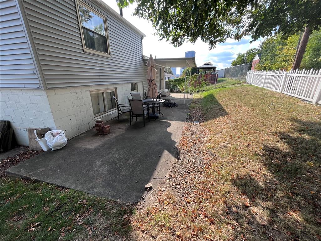 1875 Linton Street Pittsburgh, PA 15219 - Photo 24 of 24 a view of a backyard with table and chairs