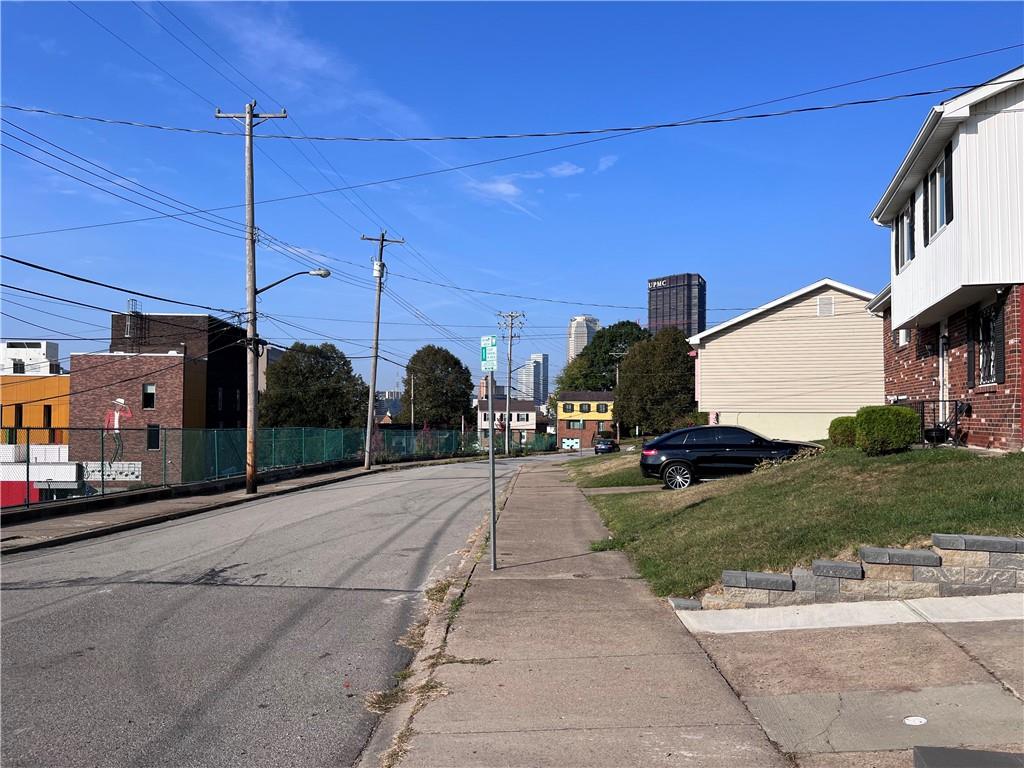 1875 Linton Street Pittsburgh, PA 15219 - Photo 3 of 24 a view of a street with cars parked