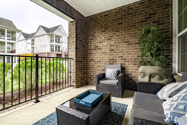 a building outdoor space with patio furniture