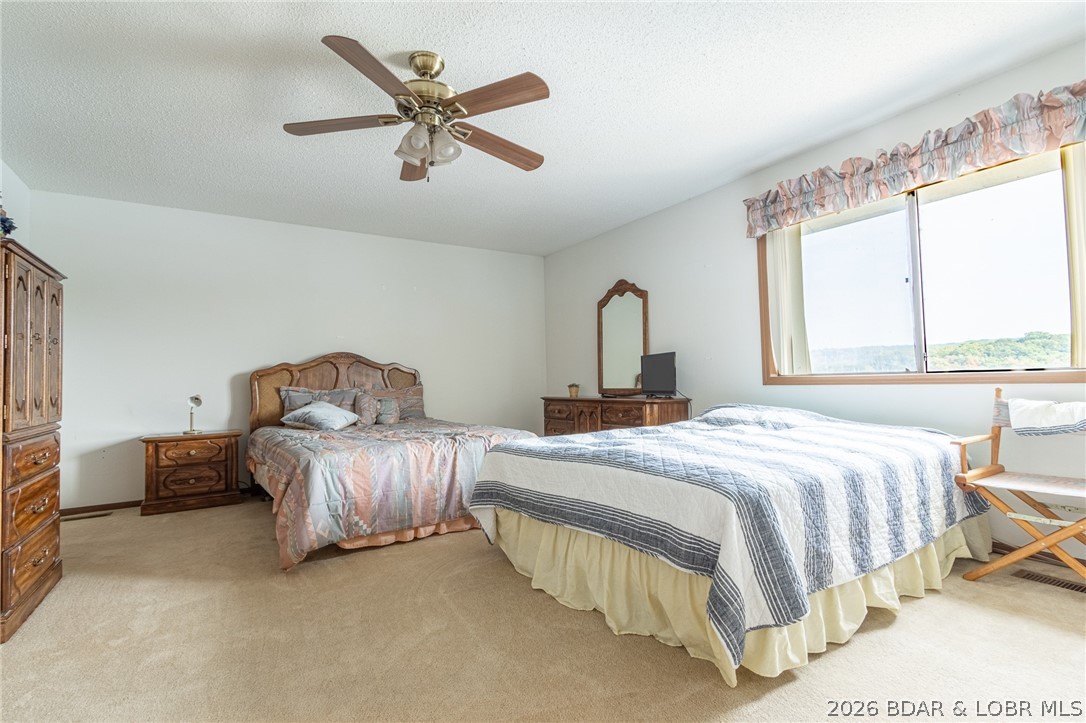 210 Bluff Boulevard, Unit 4B Camdenton, MO 65020 - Photo 21 of 69 Lofted Bedroom upper level.