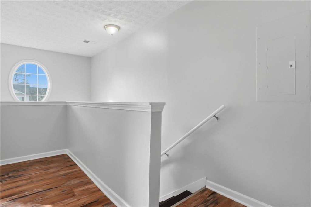 21 Timber Ridge Drive Cartersville, GA 30121 - Photo 12 of 24 a view of a room with wooden floor and entryway