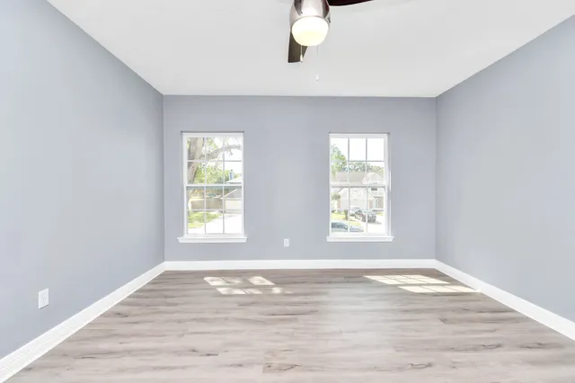 a view of an empty room and window