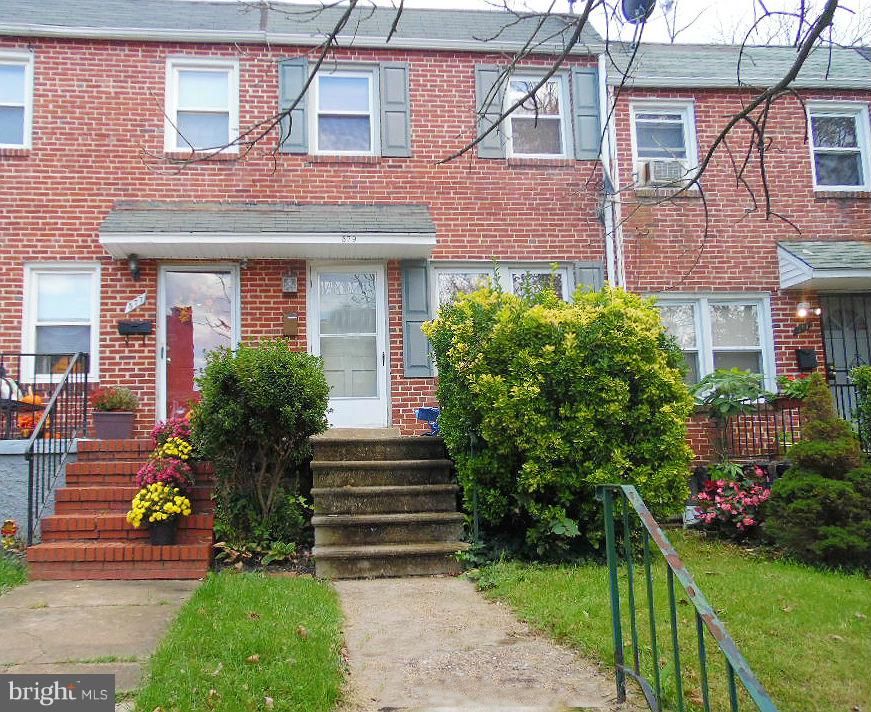 379 Marydell Road Baltimore, MD 21229 - Photo 1 of 14 a front view of a house with a yard