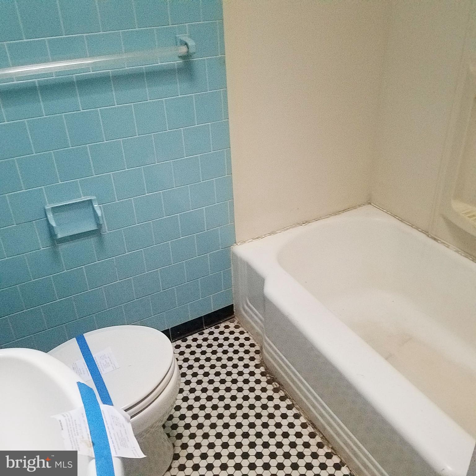 379 Marydell Road Baltimore, MD 21229 - Photo 12 of 14 a bathroom with a toilet and a sink