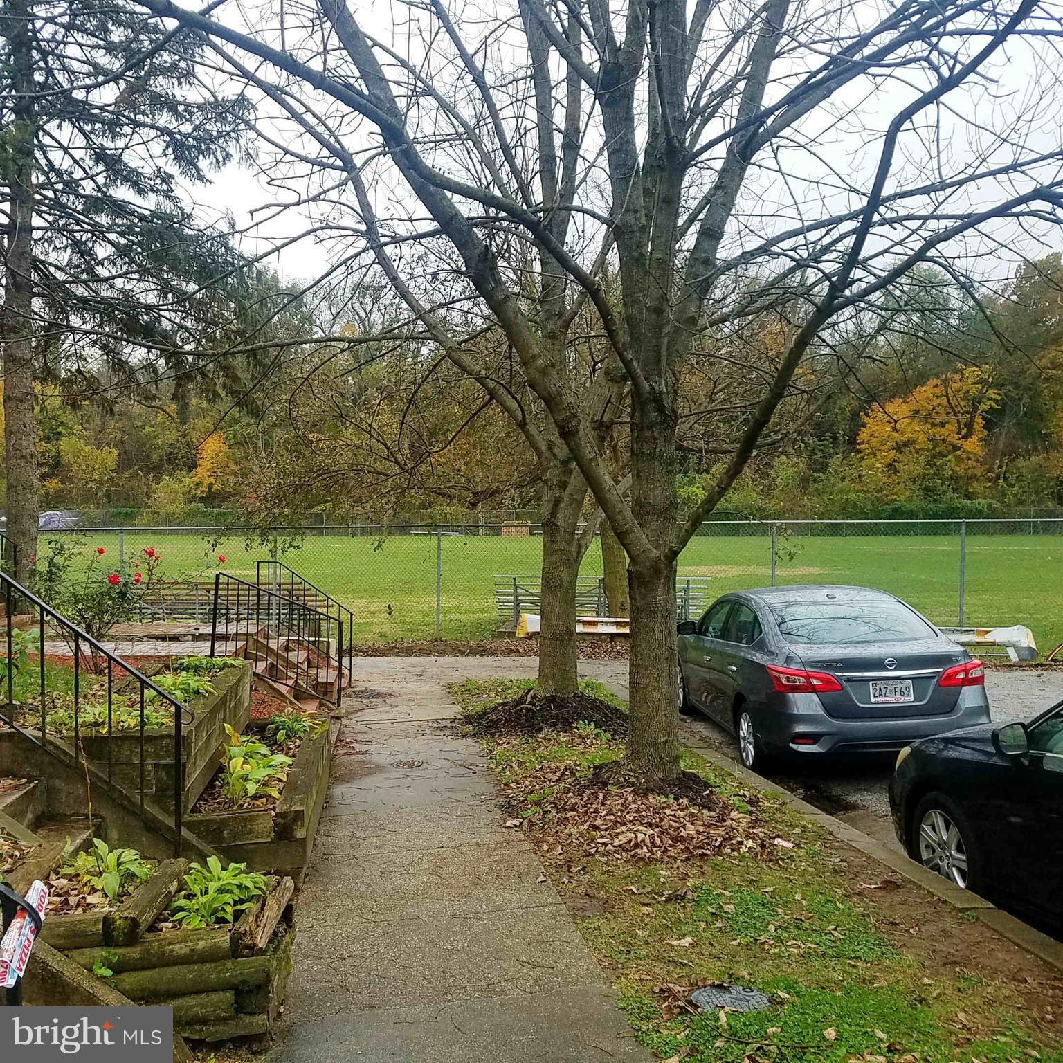 379 Marydell Road Baltimore, MD 21229 - Photo 3 of 14 a view of a street with a large tree