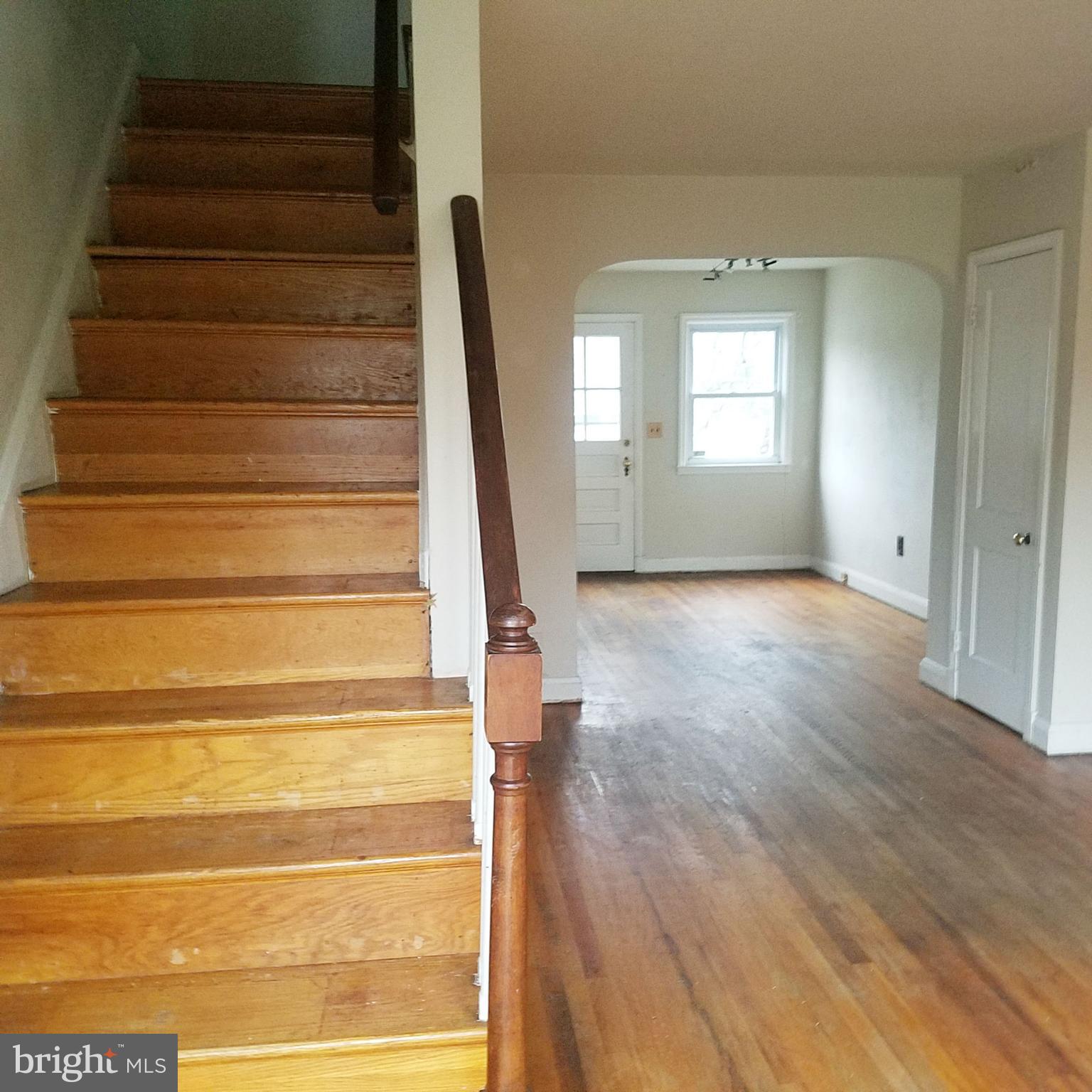 379 Marydell Road Baltimore, MD 21229 - Photo 5 of 14 a view of entryway with wooden floor and stairs