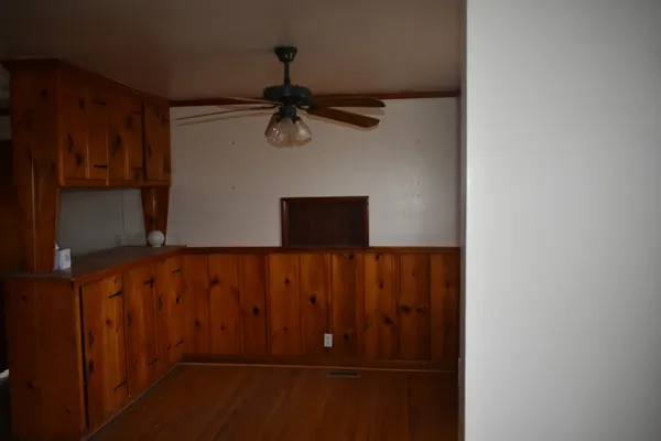 a view of a room with a window