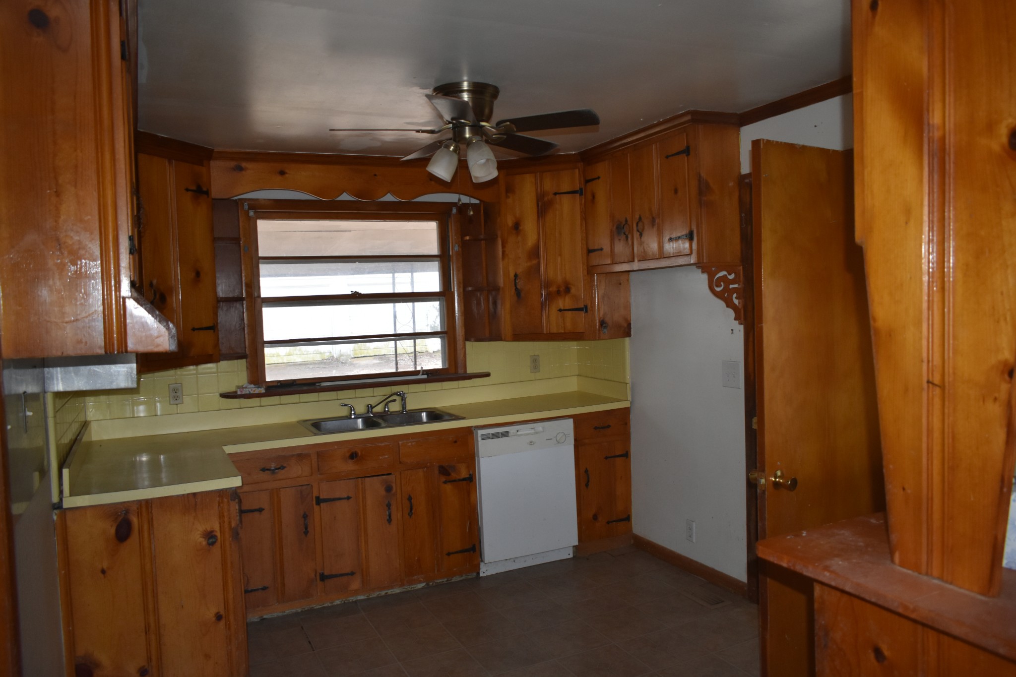 141 Hillcrest Drive Madison, TN 37115 - Photo 15 of 18 a kitchen with stainless steel appliances granite countertop cabinets and window