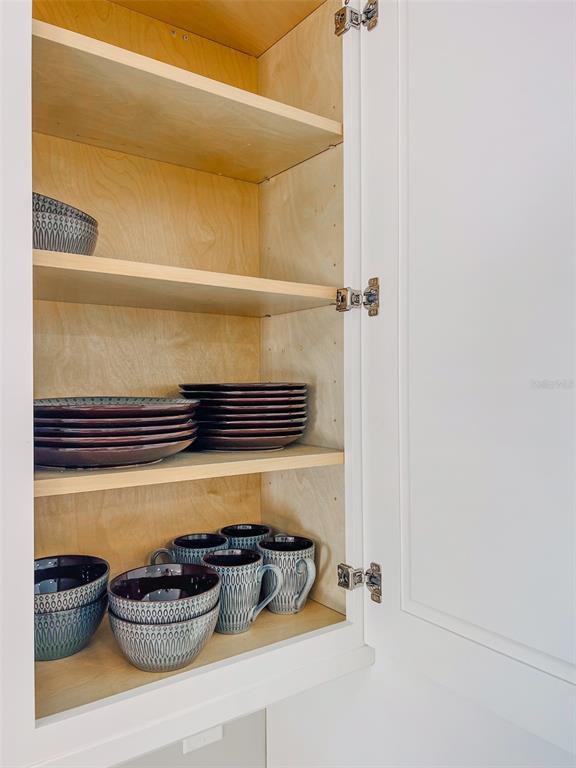 5041 North Beach Road, Unit 4A AND 4B Englewood, FL 34223 - Photo 36 of 75 a bathroom with a granite countertop sink and a potted plant