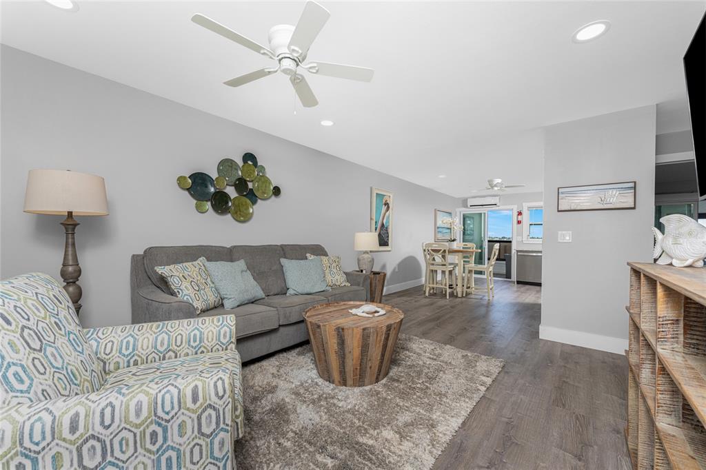 5041 North Beach Road, Unit 4A AND 4B Englewood, FL 34223 - Photo 51 of 75 a living room with furniture and a table