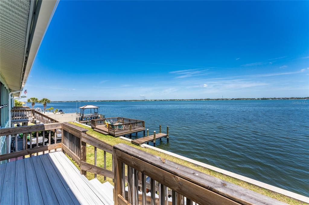 5041 North Beach Road, Unit 4A AND 4B Englewood, FL 34223 - Photo 75 of 75 a view of a balcony with an ocean view