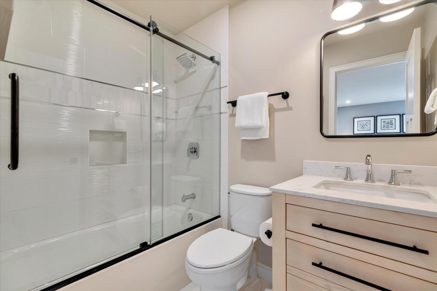 682 Ridgeview Terrace Fremont, CA 94536 - Photo 22 of 38 a bathroom with a sink a toilet and shower