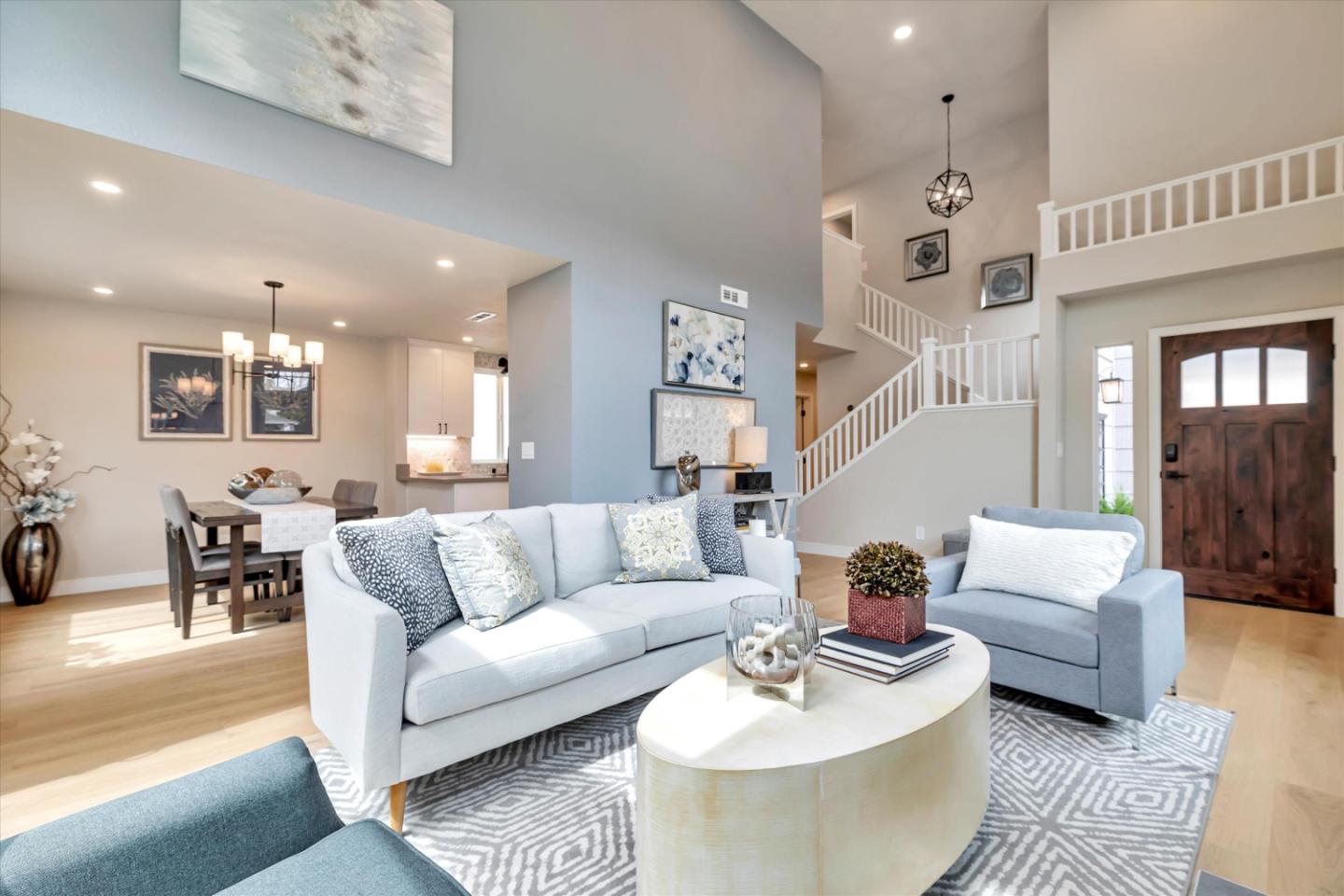682 Ridgeview Terrace Fremont, CA 94536 - Photo 5 of 38 a living room with furniture and a dining table