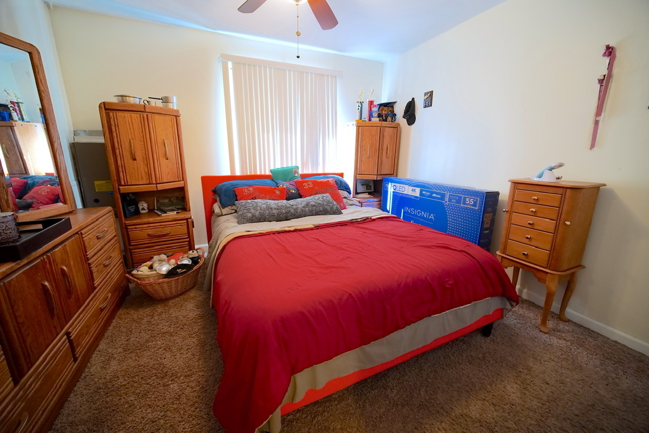 9835 South Harlem Avenue, Unit S Chicago Ridge, IL 60415 - Photo 13 of 17 a bedroom with bed and a closet