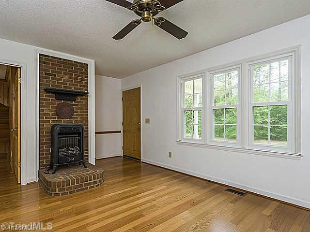1460 Miles Chapel Road Mebane, NC 27302 - Photo 3 of 16 Living Room. Entry w/ Wood Stove Option