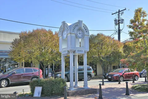 a front view of a building with garden