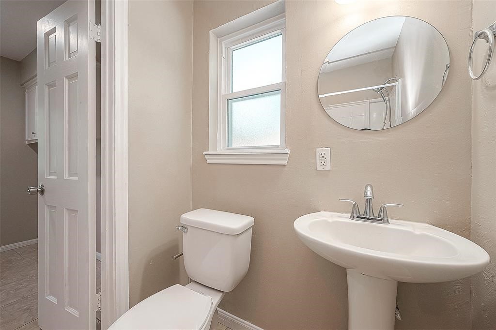 6534 Bayonne Drive Spring, TX 77389 - Photo 12 of 15 a bathroom with a sink and a mirror