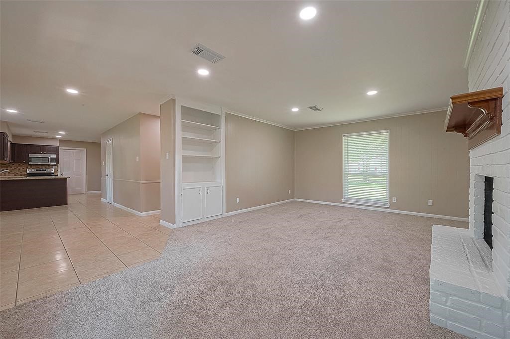 6534 Bayonne Drive Spring, TX 77389 - Photo 3 of 15 a view of an empty room with a window
