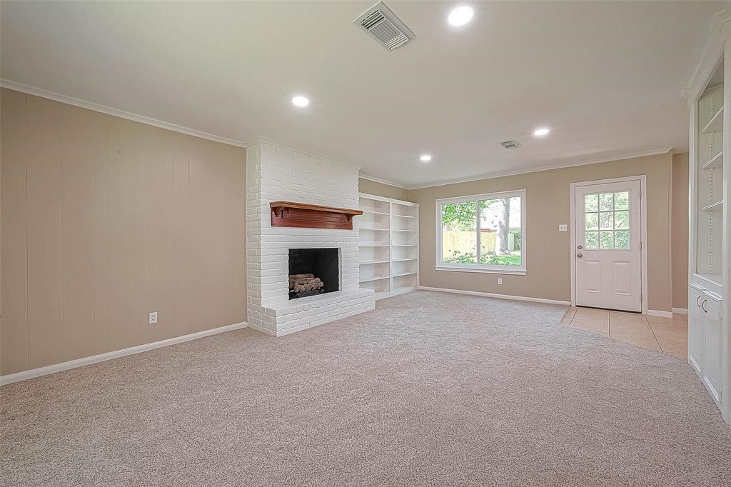 6534 Bayonne Drive Spring, TX 77389 - Photo 4 of 15 an empty room with windows