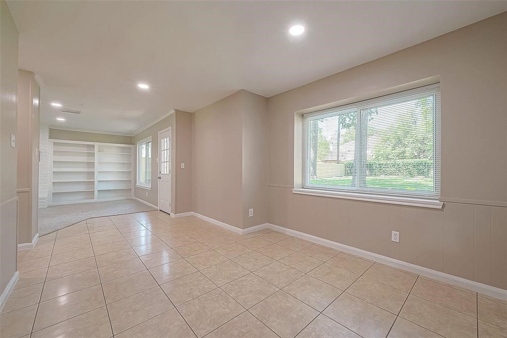 6534 Bayonne Drive Spring, TX 77389 - Photo 7 of 15 a view of an empty room with a window