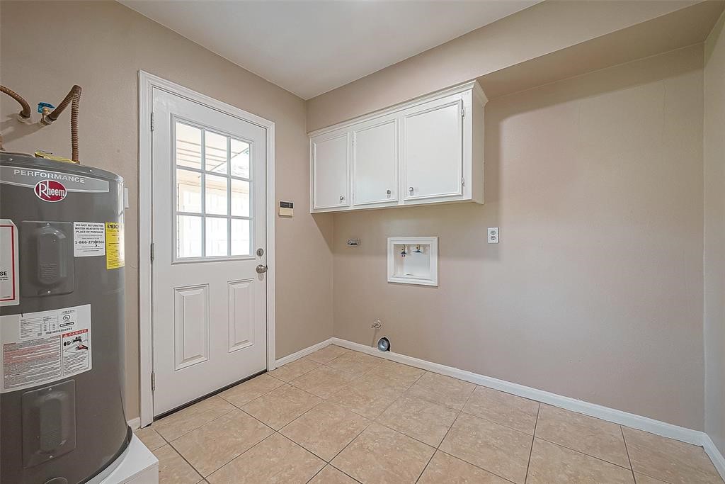 6534 Bayonne Drive Spring, TX 77389 - Photo 8 of 15 wooden floor in an empty room with a window