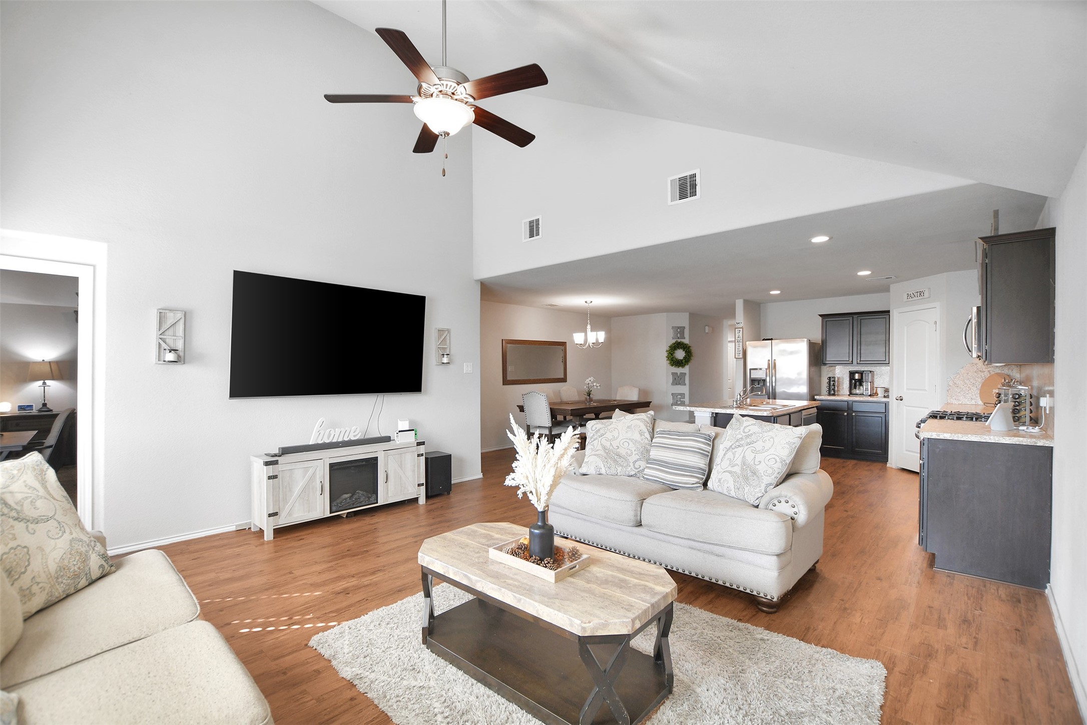 1022 Rancho Grande Drive Channelview, TX 77530 - Photo 20 of 36 a living room with furniture and a flat screen tv