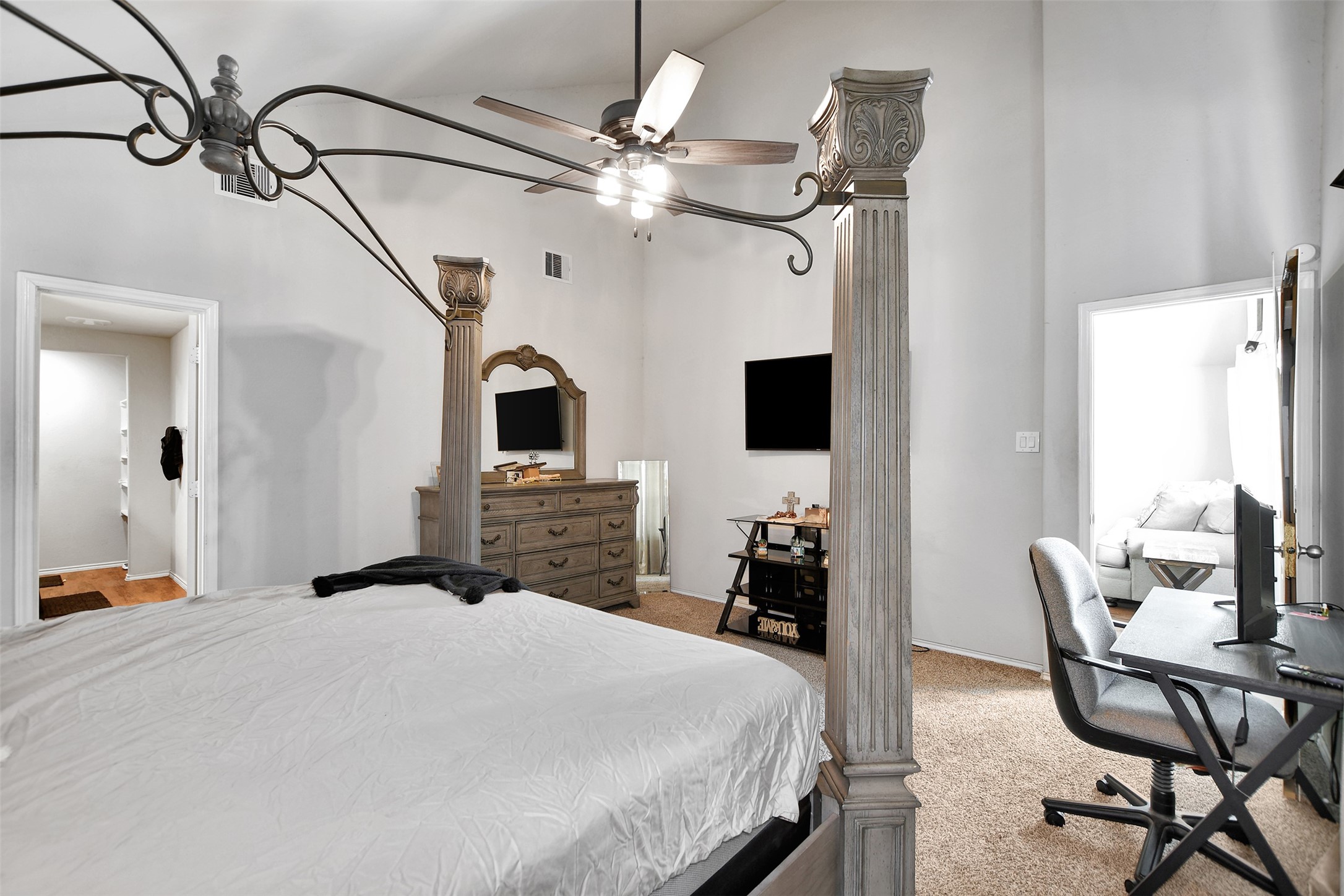 1022 Rancho Grande Drive Channelview, TX 77530 - Photo 24 of 36 a bedroom with a bed and a flat screen tv