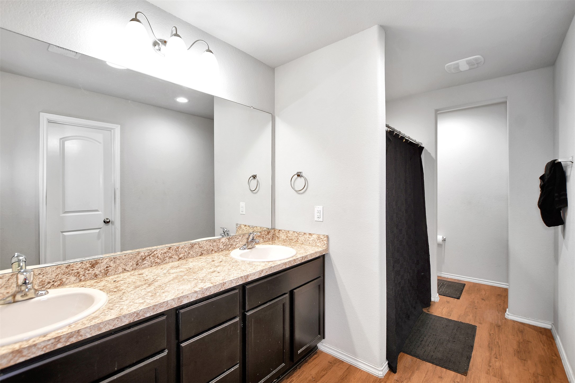 1022 Rancho Grande Drive Channelview, TX 77530 - Photo 27 of 36 a bathroom with a sink and a mirror