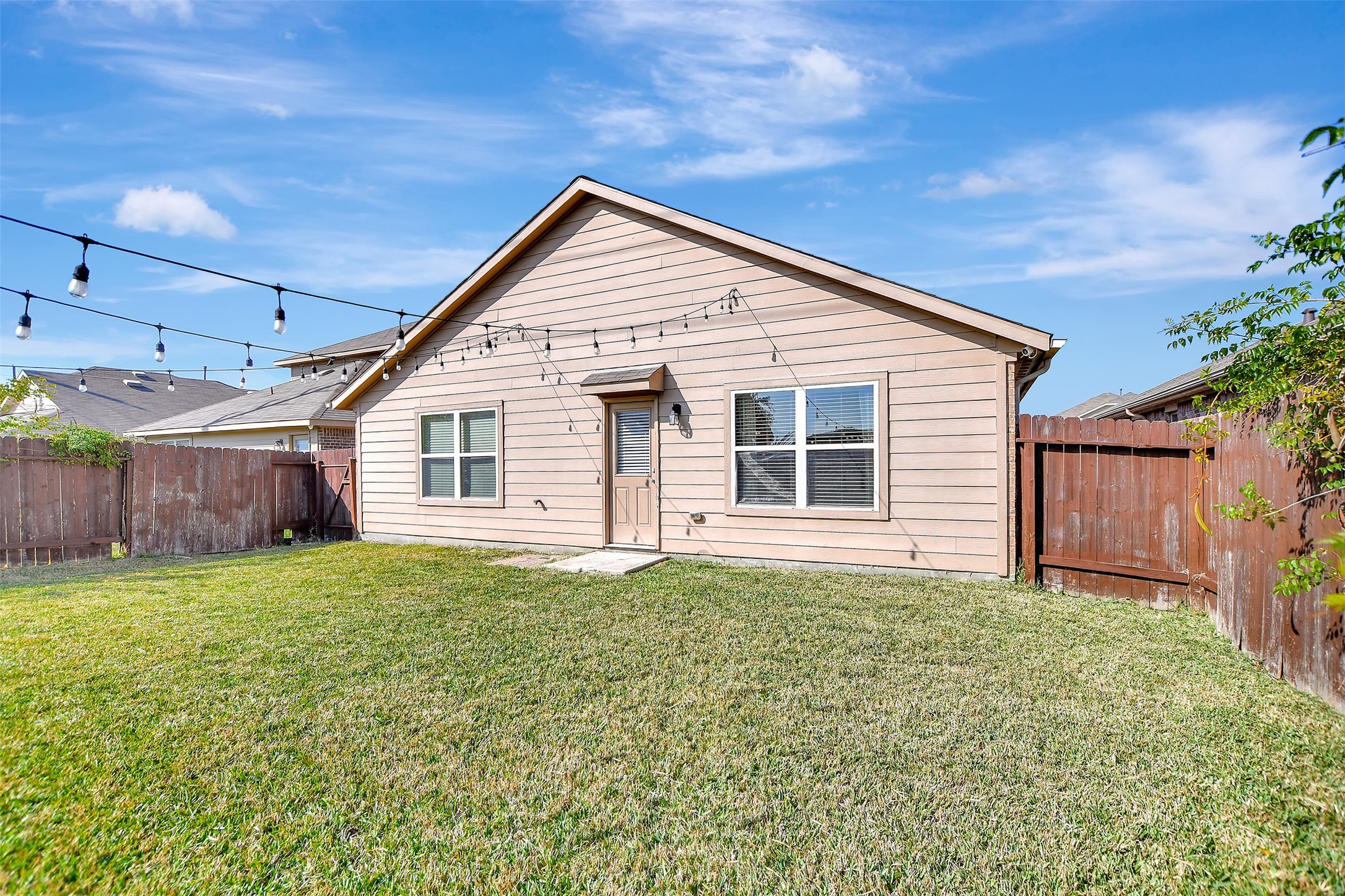 1022 Rancho Grande Drive Channelview, TX 77530 - Photo 35 of 36 a view of a house with a yard