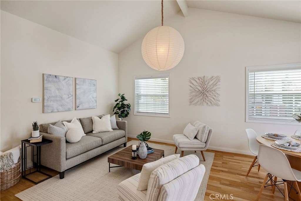 4914 Halison Street Torrance, CA 90503 - Photo 12 of 51 a living room with furniture wooden floor and a large window