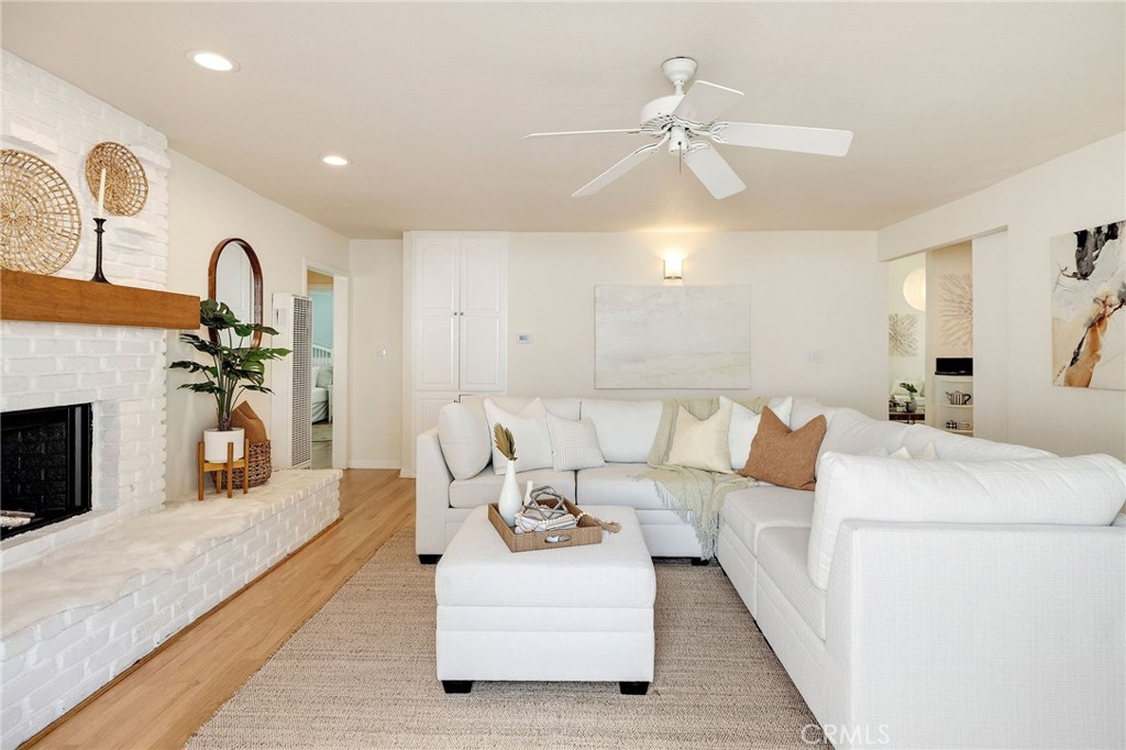 4914 Halison Street Torrance, CA 90503 - Photo 26 of 51 a living room with furniture and a fireplace